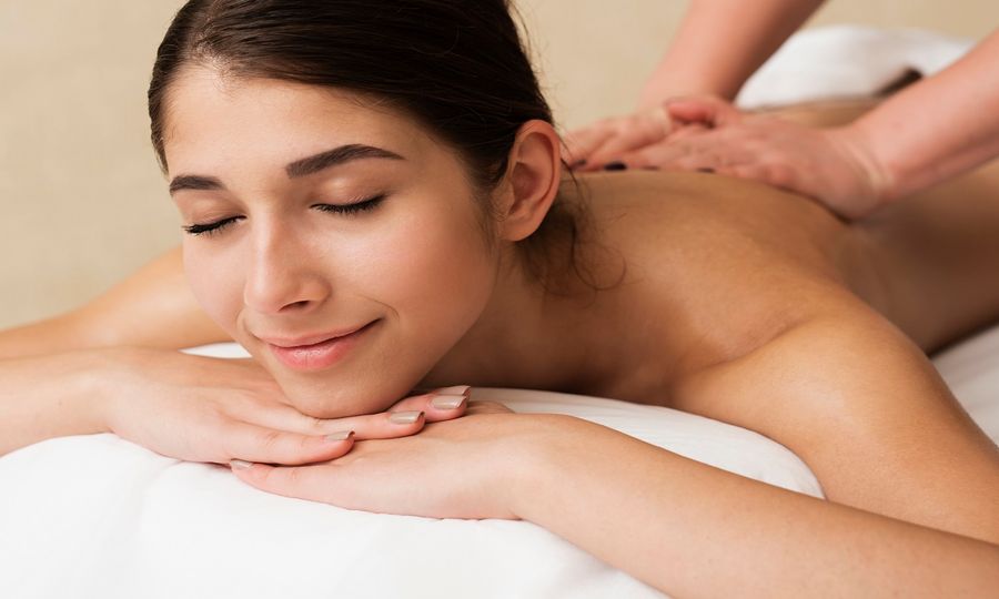 Guest relaxing during a back massage